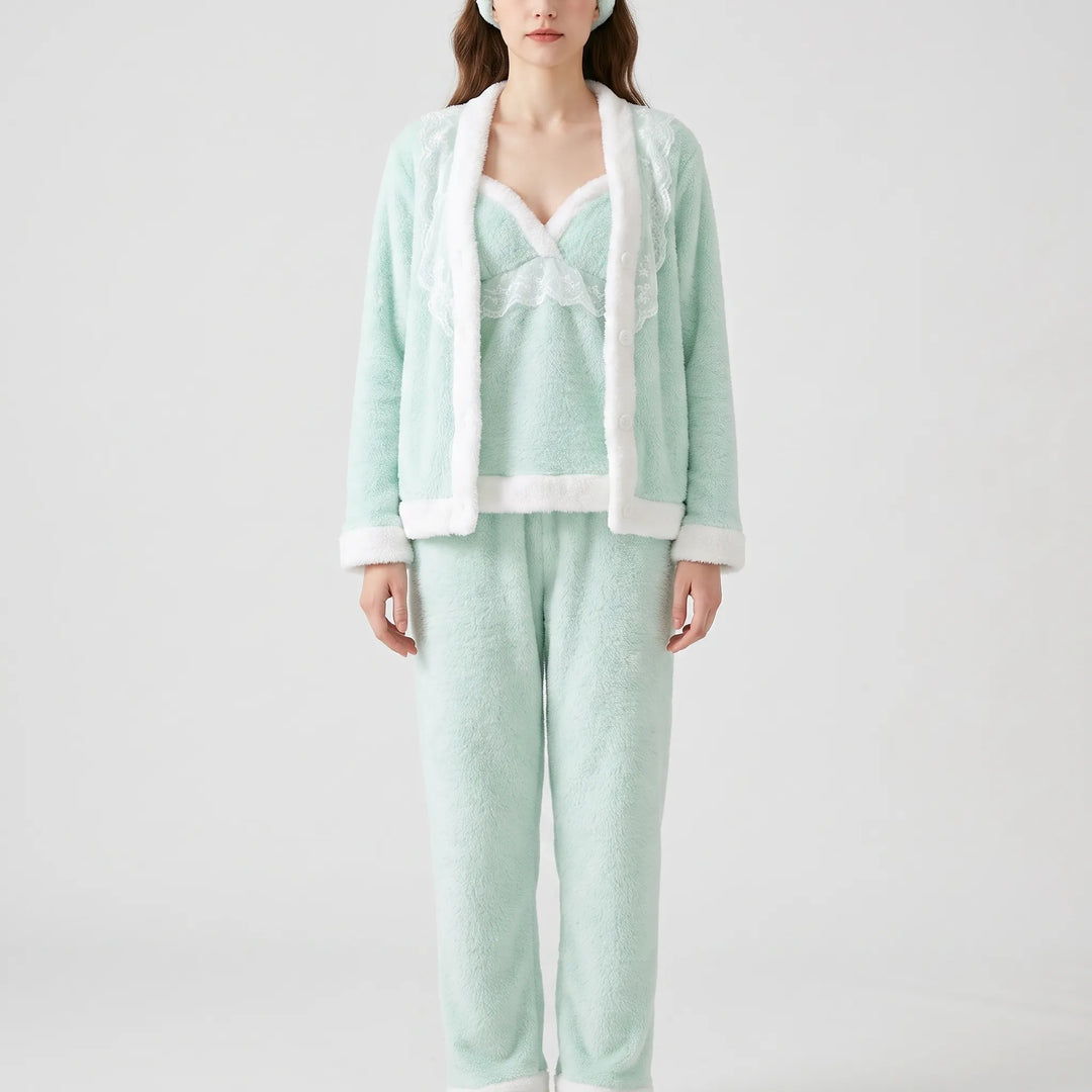 Model in the mint three-piece set with a matching headband, standing straight, showing white fuzzy trim on cardigan cuffs and trouser hems. 7