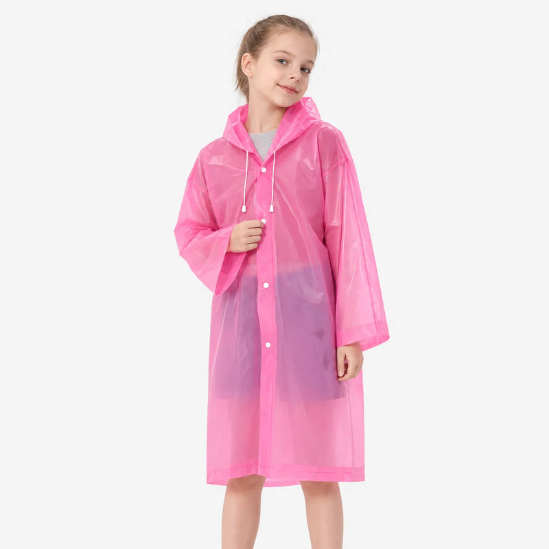 Smiling girl in a translucent pink hooded raincoat with snap buttons and white hood drawcords, posed against a white background. 4