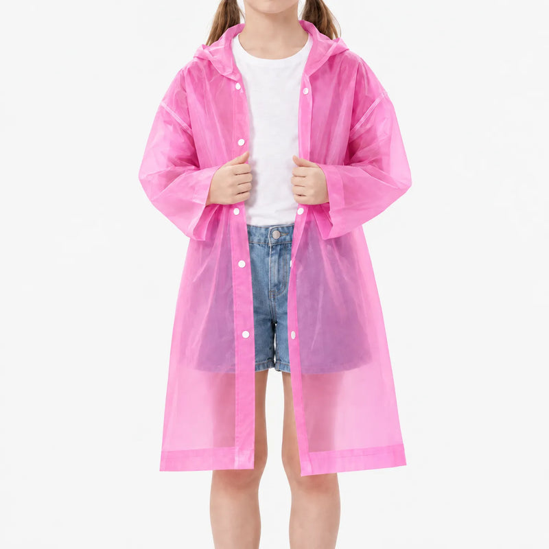 Girl in an unfastened translucent pink hooded raincoat over a white t-shirt and denim shorts, holding the front edges. 8