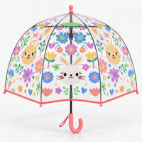 Clear dome umbrella with coral pink trim and handle, printed with bunny faces and colorful flowers, hearts and tulips. 12