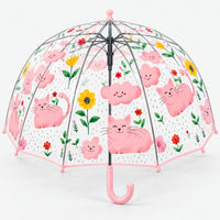 Clear dome umbrella with light pink trim and handle, printed with smiling pink cats, clouds, flowers and raindrops, seen from slightly below. 13