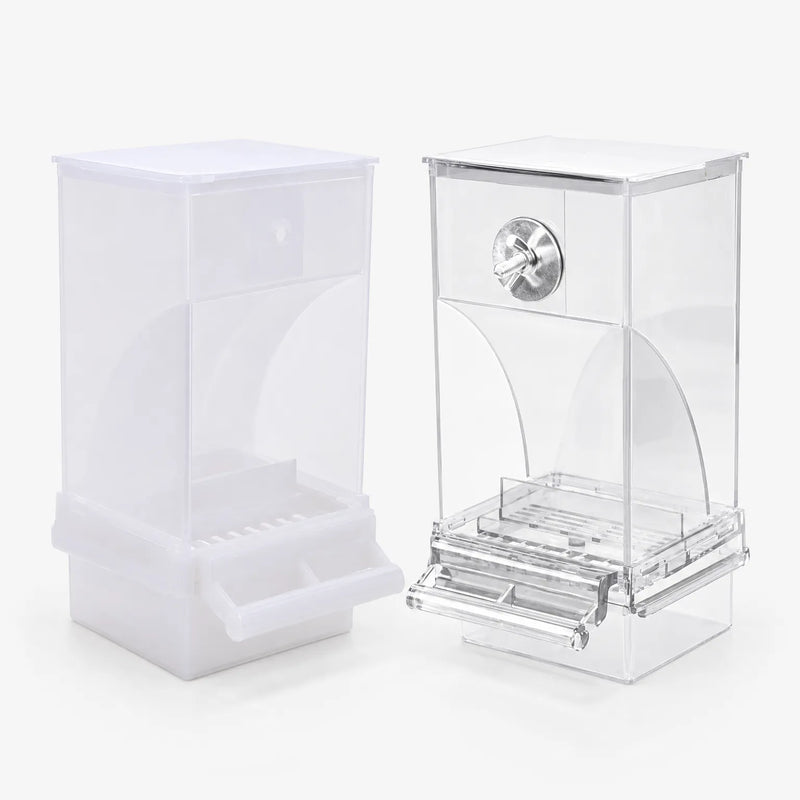 Frosted white and clear acrylic feeders side by side on a plain background, each with a lid, curved seed chute, perch and tray. 1
