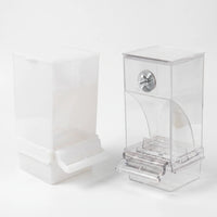 Frosted white and clear feeders shown from a slightly different angle, with the metal fixing screw and fold-out perch visible. 4