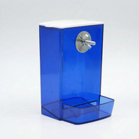 Empty blue translucent feeder with white lid, metal mounting bolt with wing nut, and a small feeding tray at the base. 5