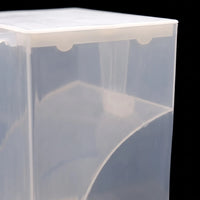 Close-up of the translucent plastic body, showing the white lid edge, small notches beneath it and the curved inner divider. 3