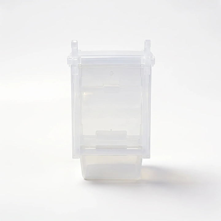 Front view of the empty clear plastic feeder on a plain white background, showing its hanging hooks and open seed tray. 1