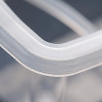 Close-up of the frosted plastic rim of the feeder, showing its smooth rounded edge and slightly textured surface. 4