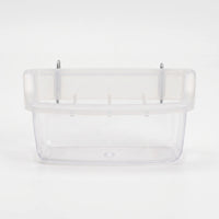 Front view of the empty small clear feeder with divider ribs and two metal hooks at the top for hanging. 6