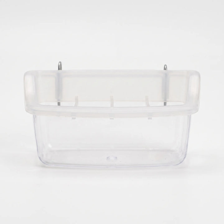 Front view of the empty small clear feeder with divider ribs and two metal hooks at the top for hanging. 6