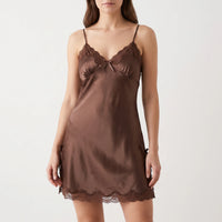 Model wearing the nightdress in chocolate brown satin with matching brown lace neckline, hem and small side bows. 6
