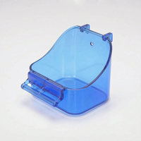 Blue translucent plastic hanging bath with a curved back, top hooks and a front perch bar, on a plain white background. 1