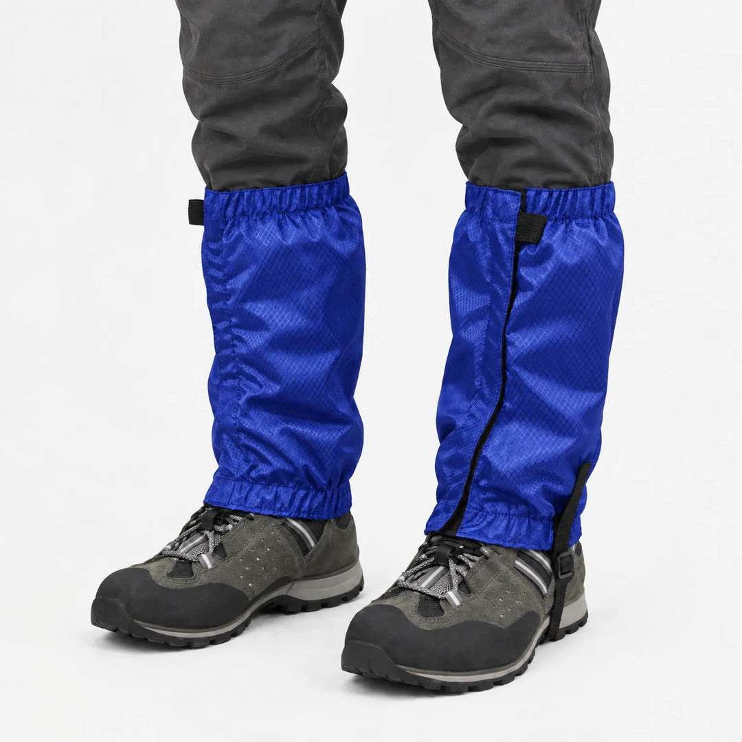 Bright blue ripstop gaiters with elastic cuffs and under-boot strap, worn over grey hiking shoes against a white background. 8
