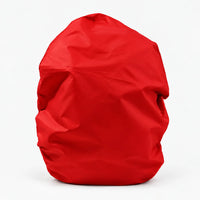 Bright red rucksack cover pulled over a bag, shown from the front against a plain white background. 8