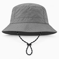 Front view of a grey bucket hat with a smooth crumpled finish, stitched brim and drawcord with toggle. 10