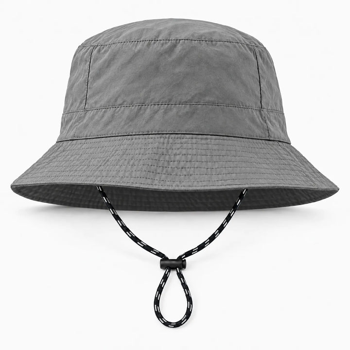 Front view of a grey bucket hat with a smooth crumpled finish, stitched brim and drawcord with toggle. 10