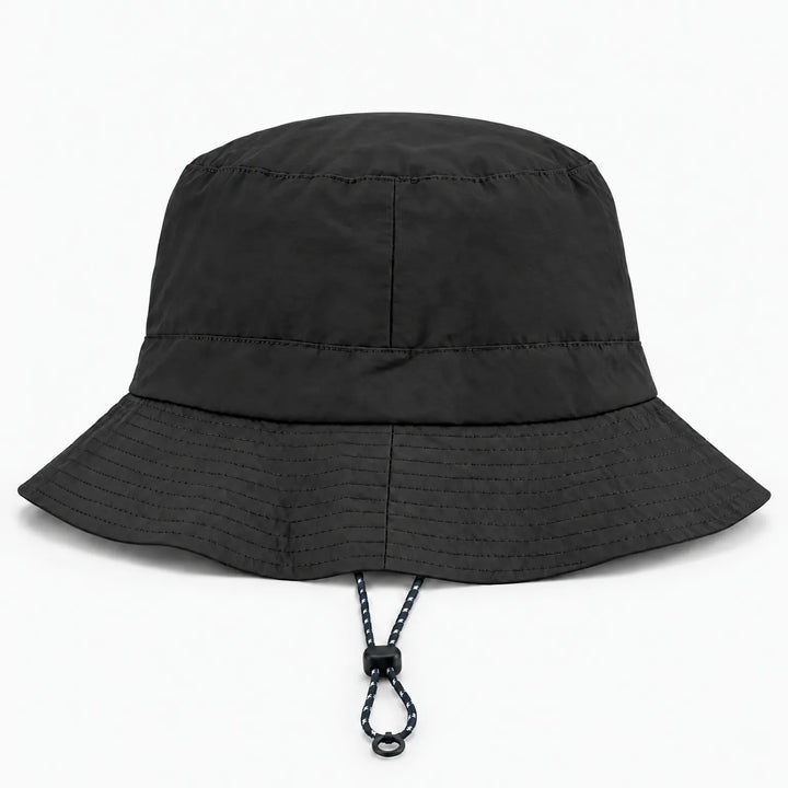 Back view of a black bucket hat showing the rear seam, rows of brim stitching and the drawcord toggle. 11