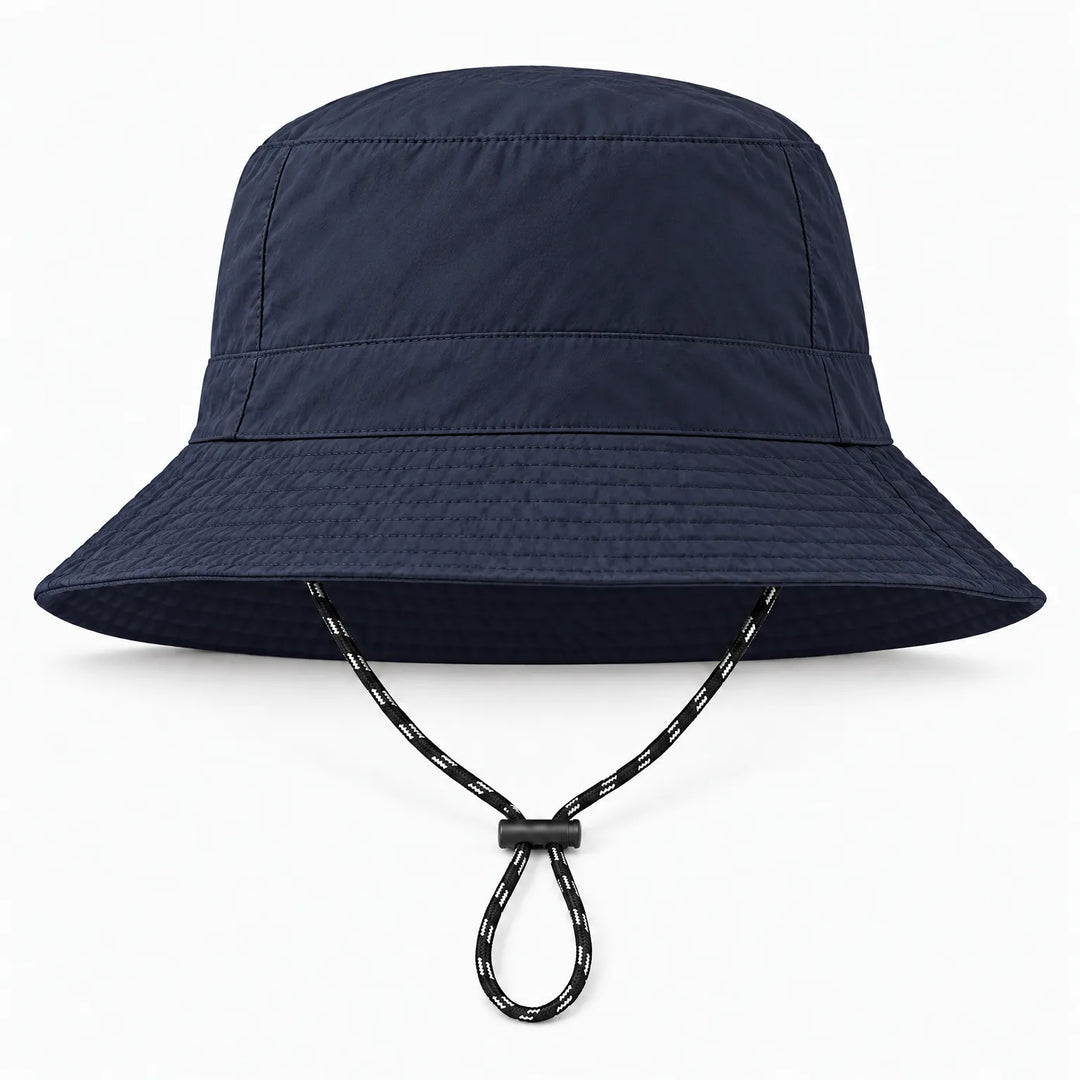 Front view of a navy bucket hat with stitched brim and black-and-white drawcord with toggle, on white. 13