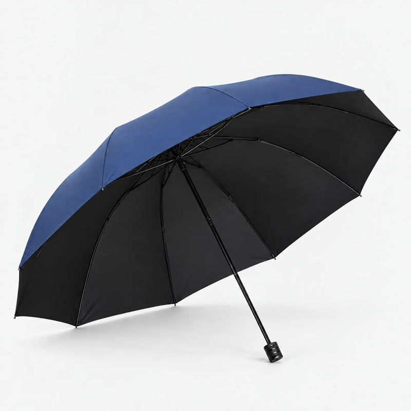 Open navy blue umbrella tilted to show its black underside, ribs and straight black handle on a white background. 2