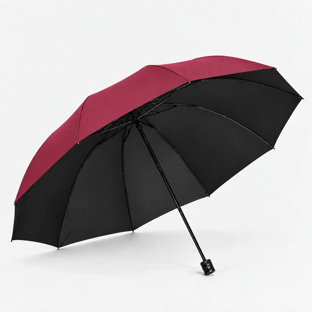 Open burgundy umbrella tilted to show its black underside, ribs and straight black handle on a white background. 6
