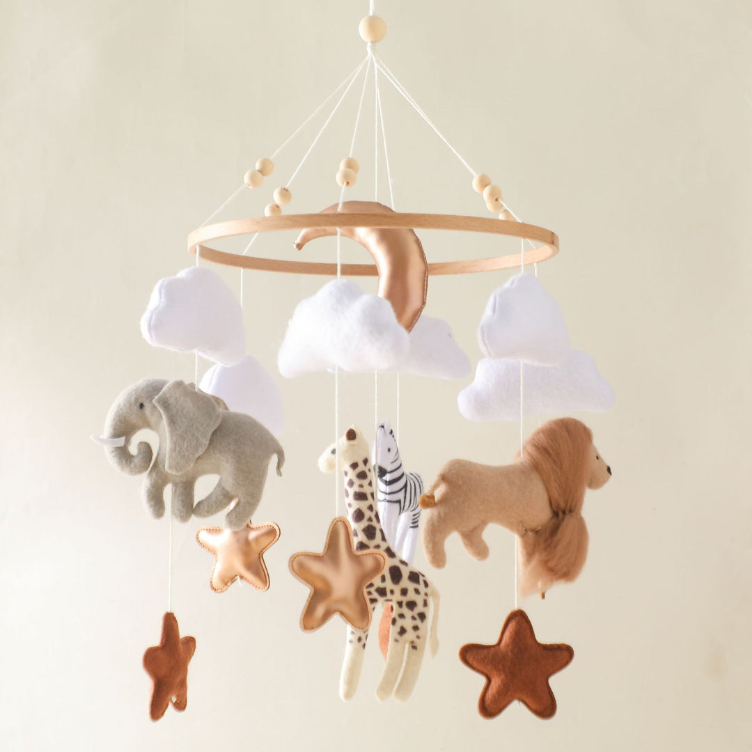 Mobile hanger with felt safari animals to stimulate babies' sensory perception.