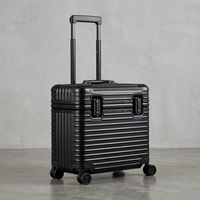 Black ribbed case with handle extended, shown at an angle against a grey concrete backdrop 12