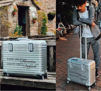 Two views of a silver ribbed case: on a wooden bench, and beside a man leaning on its handle 3