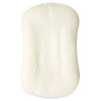 Cream crinkled muslin cover laid flat, shown from above 10