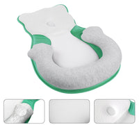 Soft positioning pillow for newborns with leg support – CozyNest