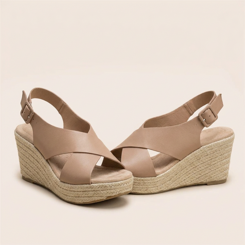 Pair of tan crossover wedge sandals with buckled heel straps, padded insoles and braided jute wedges 13