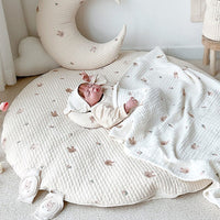 Padded cotton crawling mat for babies with embroidered animal motif – 80 cm
