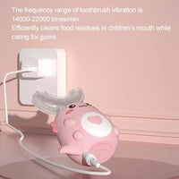 U-shaped children's toothbrush with sonic cleaning and a silicone brush head.