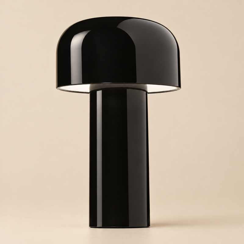 Close-up of the glossy black mushroom-shaped lamp with its wide domed shade, on a beige background 33