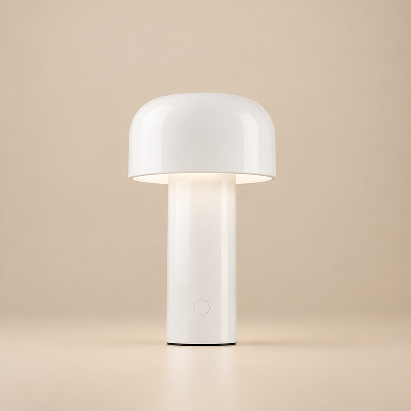Glossy white mushroom-shaped lamp lit softly against a beige backdrop, with a round button on the base 28