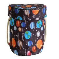 Large foldable toy tidy-up mat with basket function for the children's room.