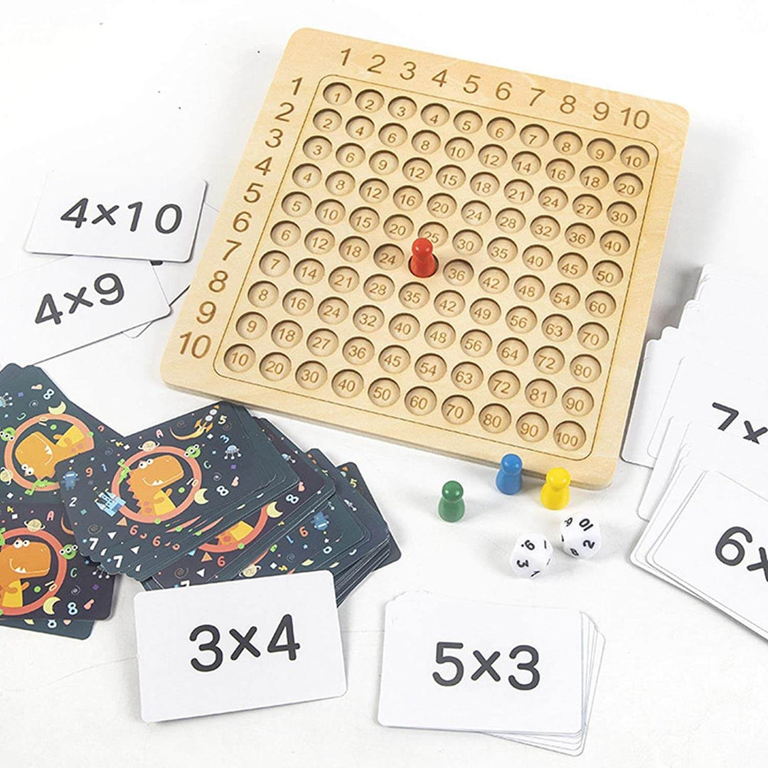 Learning game: wooden board for the 1–10 times tables with cards and dice