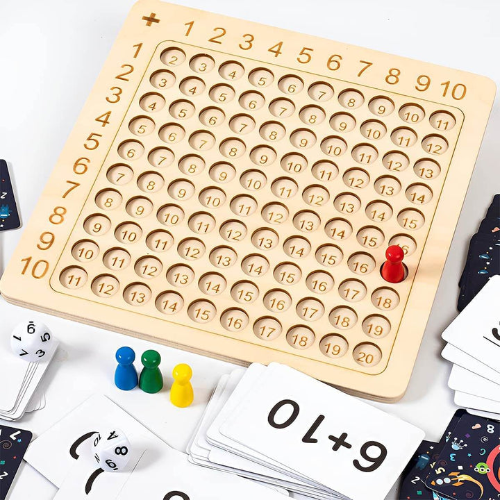 Learning game: wooden board for the 1–10 times tables with cards and dice
