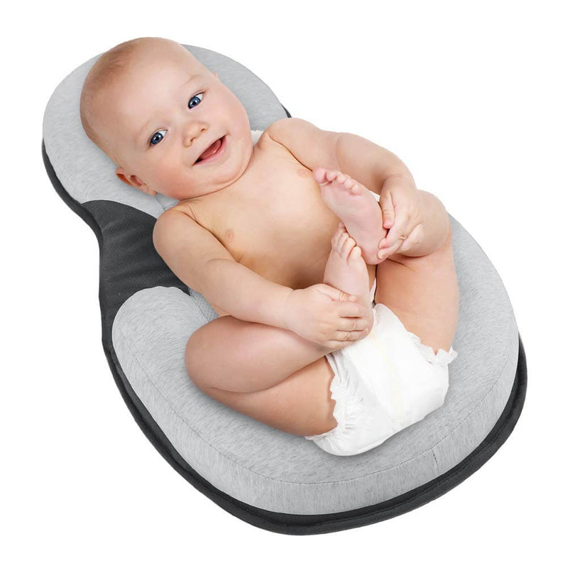 Ergonomic portable baby bed with head support to prevent flattening of the head – Sleep Cocoon