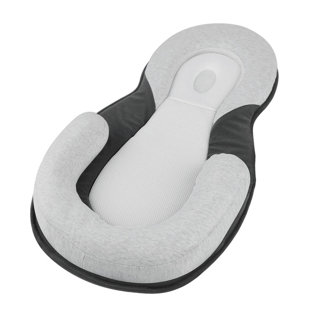 Ergonomic portable baby bed with head support to prevent flattening of the head – Sleep Cocoon