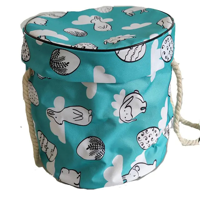 Large foldable toy tidy-up mat with basket function for the children's room.