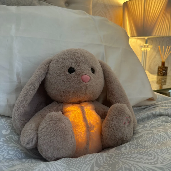 Soothing plush cuddly toy with breathing rhythm and sleep sounds – Snoozie