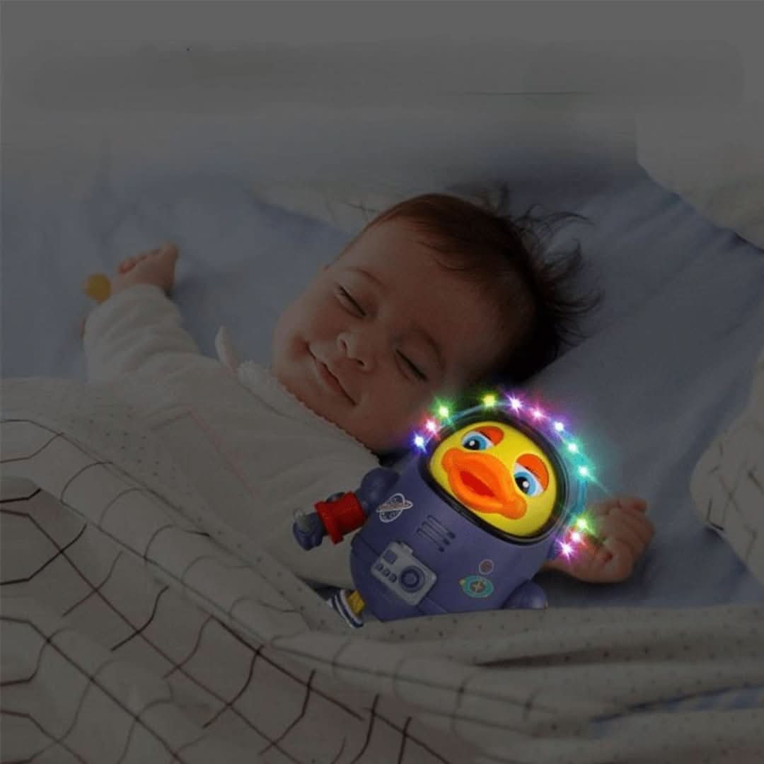 Interactive dancing duck toy with music and lighting effects for children.
