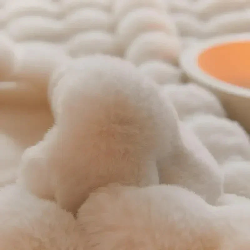 Extreme close-up of a single plush bubble of cream fleece, showing the soft pile 10