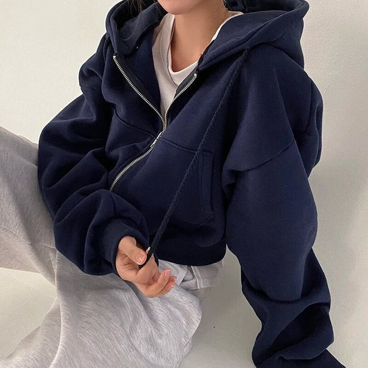 Ladies' short-cut vest with hood and oversized fit – Rinette