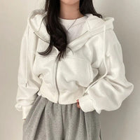 Ladies' short-cut vest with hood and oversized fit – Rinette
