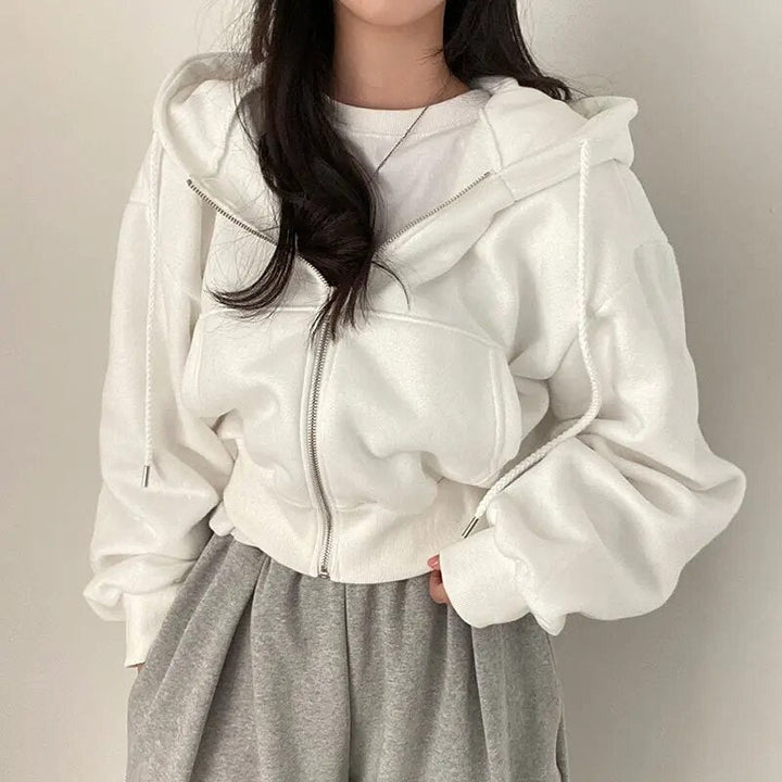 Ladies' short-cut vest with hood and oversized fit – Rinette