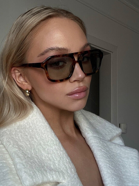 Vintage sunglasses with UV protection and retro charm – Loreen-Black/Orange-State of Style