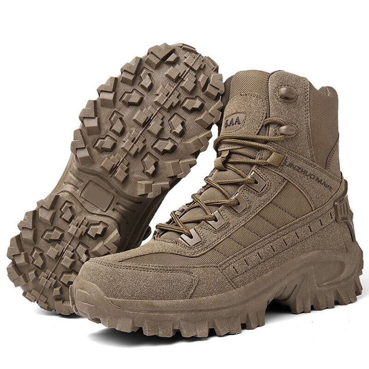 Brown boot upright beside its twin tilted to show the aggressive tread on the sole 16