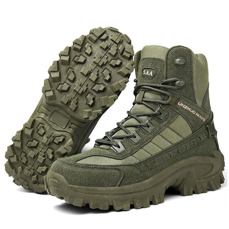 Pair of olive green high-top lace-up boots, one upright and one tipped to show its chunky lugged sole 21