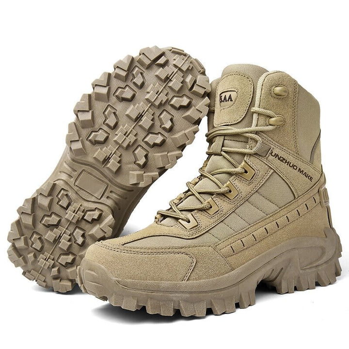 Sand-coloured boot standing beside its pair, whose sole pattern faces the camera 9