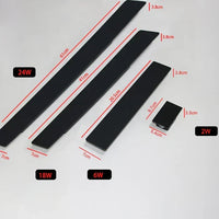 Flat lay of four black lamp bodies in different sizes with length labels and wattage tags 5